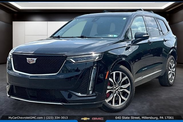 2024 Cadillac XT6 Sport in Stellar Black Metallic — front three-quarter view